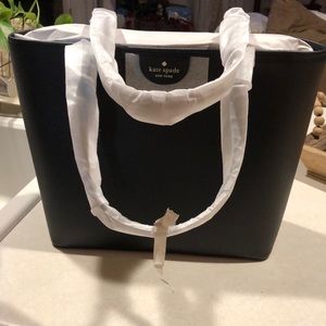 Kate spade tote.  Brand new.